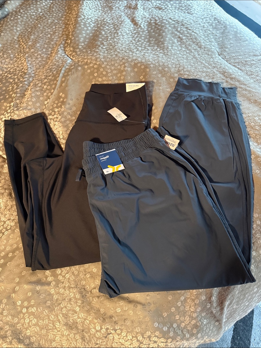 Old Navy Black Leggings and Navy Blue joggers.